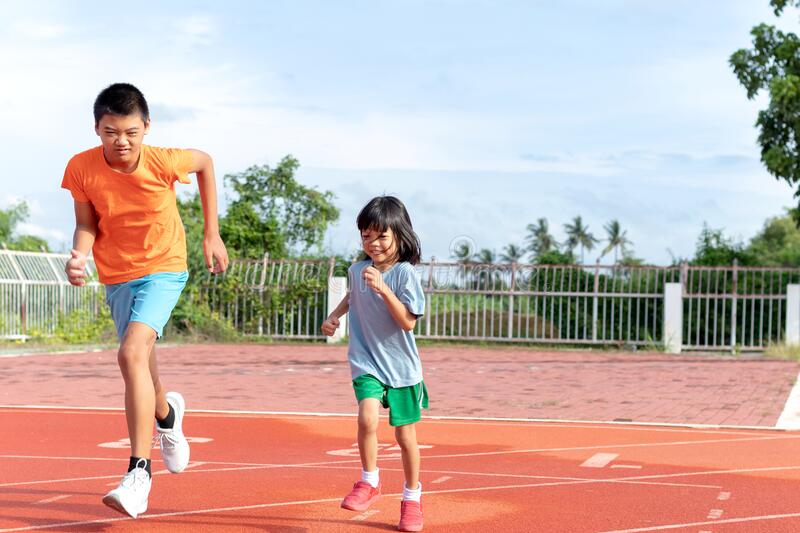 asian-children-thai-kids-boys-girls-brother-sister-running-outdoor-field-jogging-strengthens-body-asian-242779737